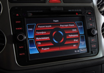 Подержанный автомобиль Volkswagen Tiguan 2010 года (13 фото)