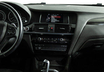 Подержанный автомобиль BMW X4 2015 года (14 фото)