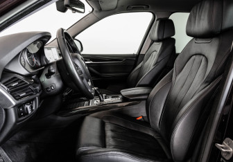 Подержанный автомобиль BMW X5 2016 года (23 фото)