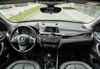 Подержанный автомобиль BMW X1 2016 года (14 фото)