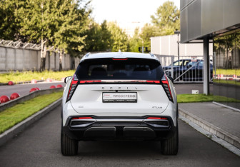 Подержанный автомобиль Geely Atlas 2023 года (7 фото)