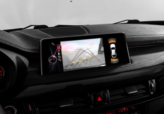 Подержанный автомобиль BMW X6 2015 года (14 фото)