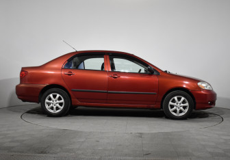 Подержанный автомобиль Toyota Corolla Sedan 2002 года (4 фото)