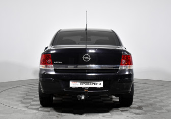 Подержанный автомобиль Opel Astra Sedan 2010 года (6 фото)
