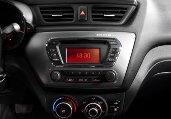 Подержанный автомобиль Kia Rio Hatchback 2015 года (13 фото)