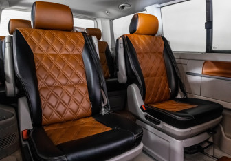 Подержанный автомобиль Volkswagen Multivan 2015 года (23 фото)