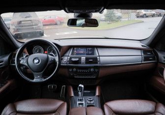 Подержанный автомобиль BMW X6 2013 года (11 фото)