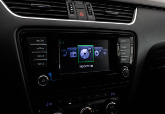 Подержанный автомобиль Skoda Octavia Liftback 2014 года (15 фото)