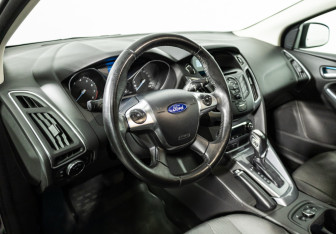 Подержанный автомобиль Ford Focus Hatchback 2014 года (11 фото)