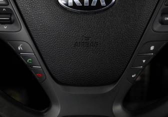 Подержанный автомобиль Kia Cerato Sedan 2014 года (14 фото)
