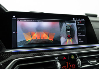 Подержанный автомобиль BMW X6 M 2021 года (22 фото)