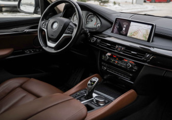 Подержанный автомобиль BMW X6 2017 года (11 фото)