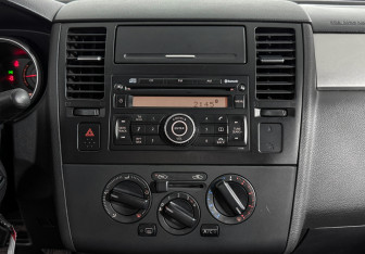Подержанный автомобиль Nissan Tiida Sedan 2008 года (18 фото)