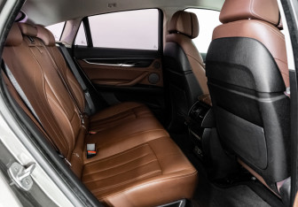 Подержанный автомобиль BMW X6 2017 года (26 фото)