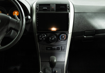 Подержанный автомобиль Toyota Corolla Sedan 2008 года (14 фото)