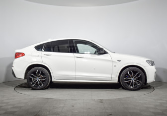 Подержанный автомобиль BMW X4 2015 года (4 фото)