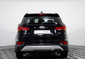 Подержанный автомобиль Hyundai Santa Fe 2015 года (6 фото)