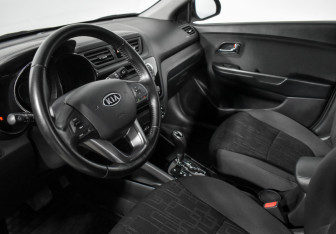 Подержанный автомобиль Kia Rio Hatchback 2012 года (9 фото)