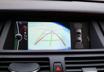 Подержанный автомобиль BMW X6 2013 года (19 фото)