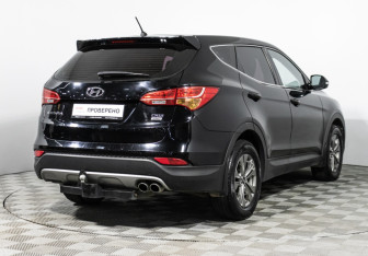 Подержанный автомобиль Hyundai Santa Fe 2014 года (5 фото)