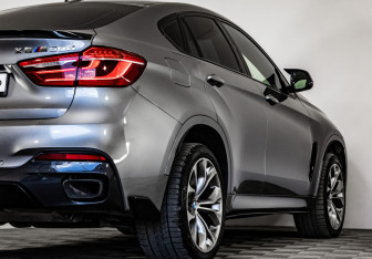 Подержанный автомобиль BMW X6 2018 года (6 фото)
