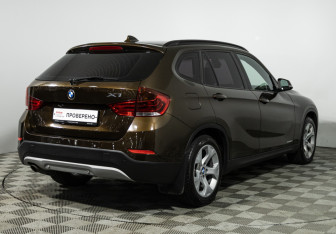 Подержанный автомобиль BMW X1 2014 года (5 фото)