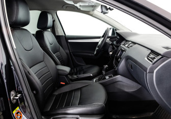 Подержанный автомобиль Skoda Octavia Liftback 2014 года (15 фото)