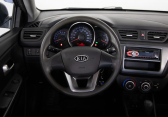 Подержанный автомобиль Kia Rio Sedan 2012 года (10 фото)