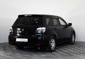 Подержанный автомобиль Mitsubishi Airtrek 2004 года (5 фото)