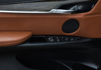 Подержанный автомобиль BMW X6 2016 года (23 фото)