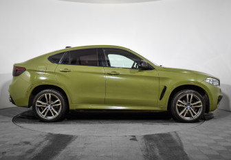 Подержанный автомобиль BMW X6 2014 года (4 фото)
