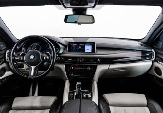 Подержанный автомобиль BMW X6 2018 года (12 фото)