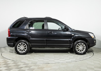 Подержанный автомобиль Kia Sportage 2010 года (4 фото)