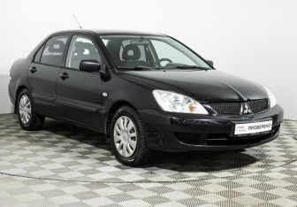 Подержанный автомобиль Mitsubishi Lancer Sedan 2009 года (3 фото)