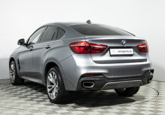Подержанный автомобиль BMW X6 2017 года (7 фото)