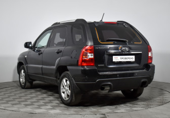 Подержанный автомобиль Kia Sportage 2009 года (7 фото)