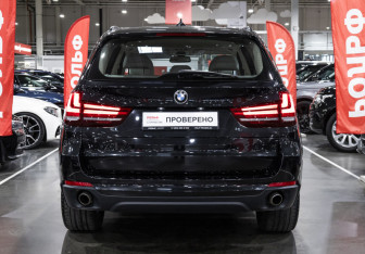 Подержанный автомобиль BMW X5 2015 года (7 фото)