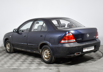Подержанный автомобиль Nissan Almera Classic 2010 года (7 фото)