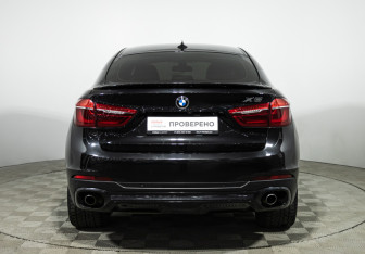 Подержанный автомобиль BMW X6 2015 года (6 фото)