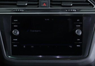 Подержанный автомобиль Volkswagen Tiguan 2018 года (12 фото)