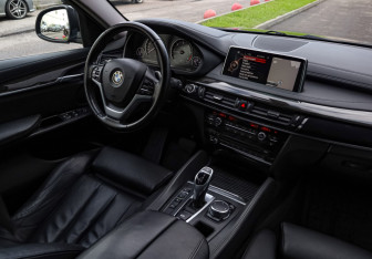 Подержанный автомобиль BMW X6 2016 года (9 фото)