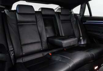 Подержанный автомобиль BMW X6 2013 года (25 фото)
