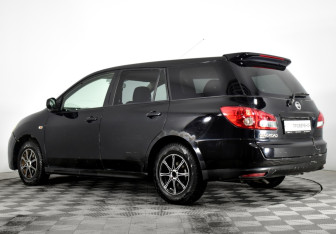 Подержанный автомобиль Nissan Wingroad 2005 года (7 фото)