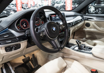 Подержанный автомобиль BMW X6 2018 года (16 фото)