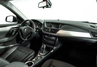 Подержанный автомобиль BMW X1 2014 года (9 фото)