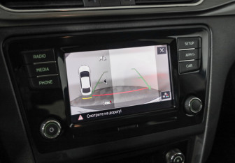 Подержанный автомобиль Skoda Rapid Liftback 2018 года (14 фото)
