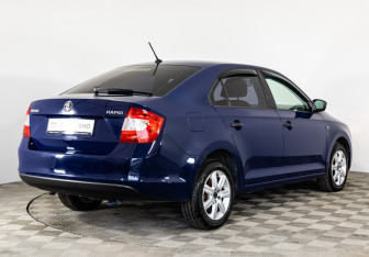 Подержанный автомобиль Skoda Rapid Liftback 2015 года (5 фото)