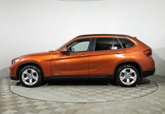 Подержанный автомобиль BMW X1 2013 года (8 фото)