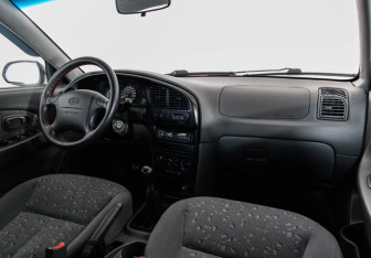 Подержанный автомобиль Kia Spectra Sedan 2008 года (9 фото)