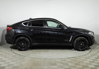 Подержанный автомобиль BMW X6 2015 года (4 фото)